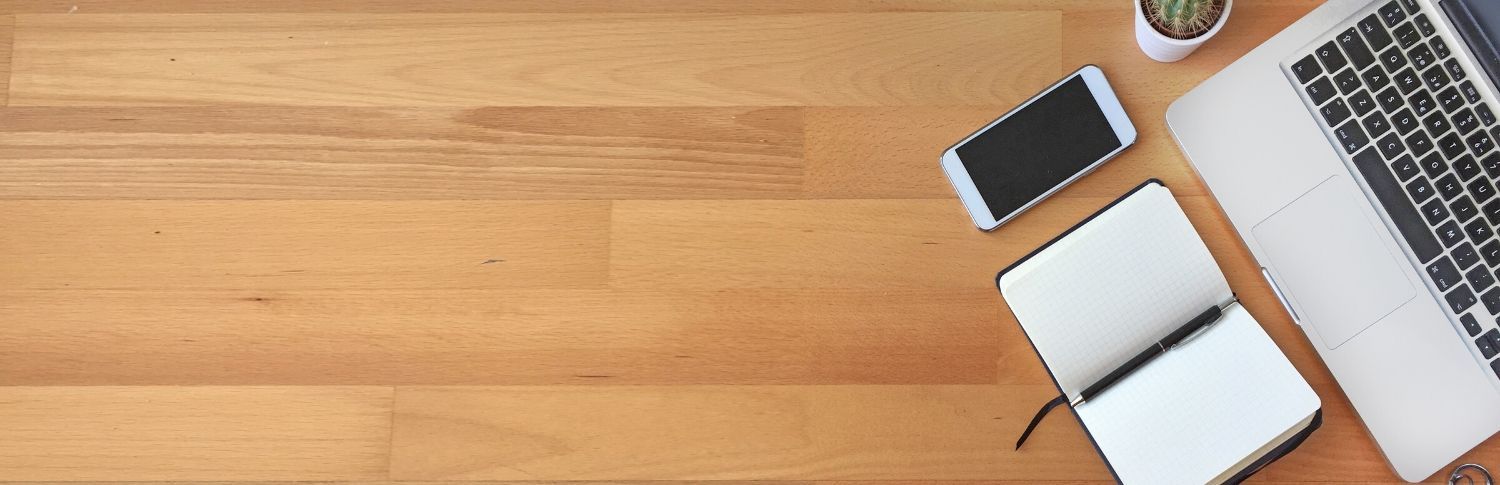 Iphone Diary and Macbook on Table