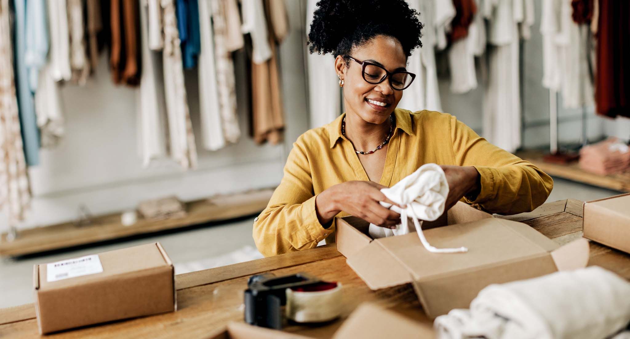 Female dropshipper fulfils quality clothing orders, making success in the ecommerce business